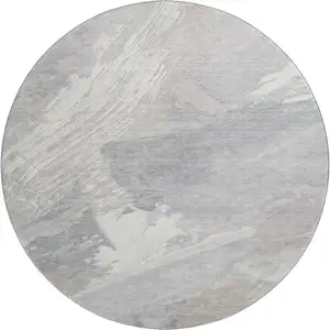 Photo of 8' X 8' Beige Gray And Silver Abstract Washable Round Rug With UV Protection