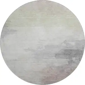 Photo of 8' X 8' Beige Gray And Silver Abstract Washable Round Rug With UV Protection