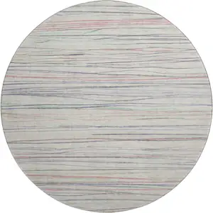 Photo of 8' X 8' Beige Pink And Purple Striped Washable Round Rug With UV Protection