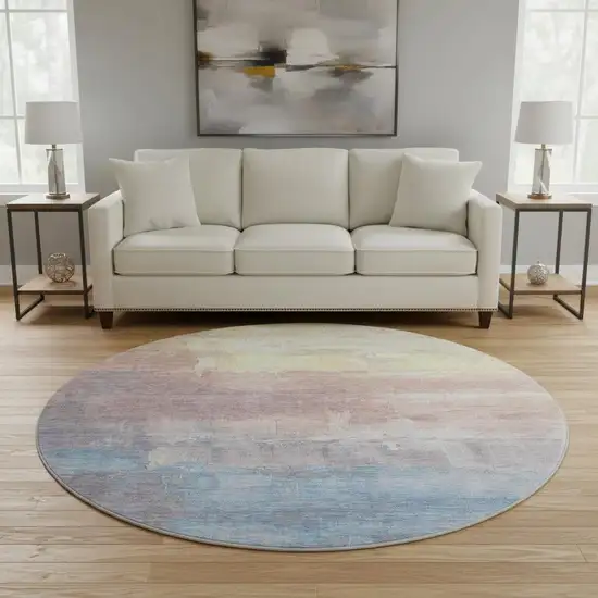 8' X 8' Beige Salmon And Blue Abstract Washable Round Rug With UV Protection Photo 2