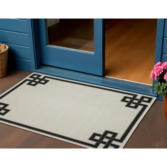 Beige and Black Stain Resistant Indoor Outdoor Area Rug Photo 1