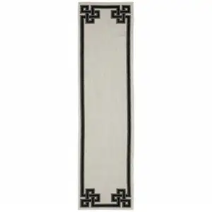 Photo of 2' X 7' Beige Stain Resistant Indoor Outdoor Area Rug