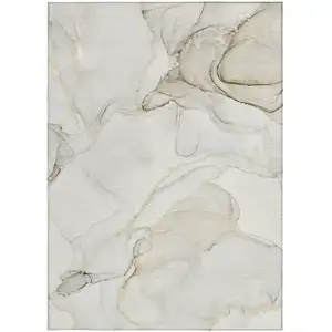 Photo of 3' X 5' Beige and Ivory Abstract Washable Non Skid Indoor Outdoor Area Rug