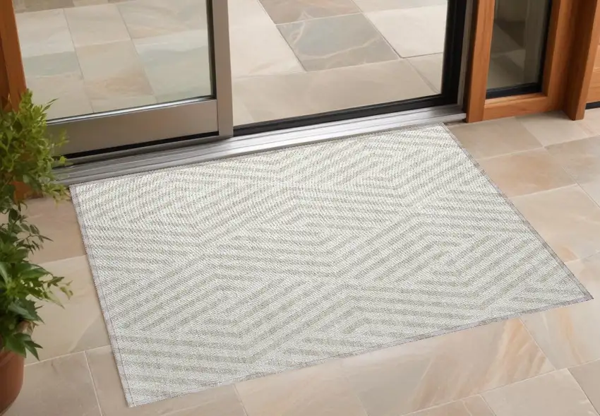 3' X 4' Beige and Ivory Geometric Washable Non Skid Indoor Outdoor Area Rug Photo 1