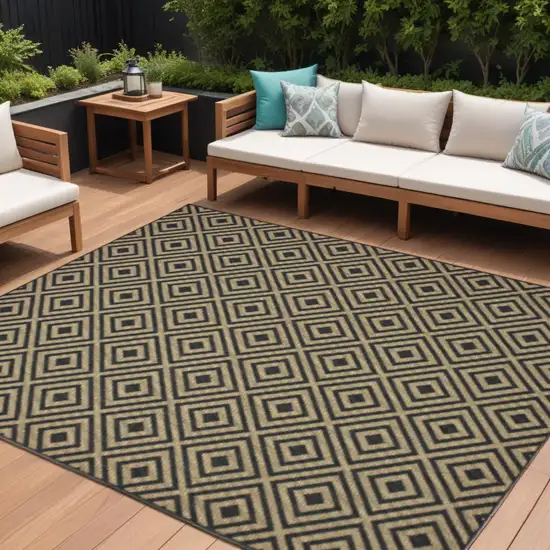 Black and Tan Geometric Stain Resistant Indoor Outdoor Area Rug Photo 1
