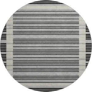 Photo of 8' X 8' Black Gray And Silver Striped Washable Round Rug With UV Protection