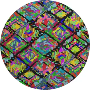 Photo of 8' X 8' Black Red Pink And Green Geometric Washable Round Rug With UV Protection