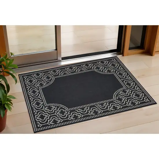 Black and Ivory Stain Resistant Indoor Outdoor Area Rug Photo 1