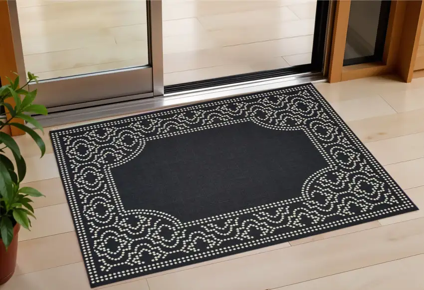 Black and Ivory Stain Resistant Indoor Outdoor Area Rug Photo 1