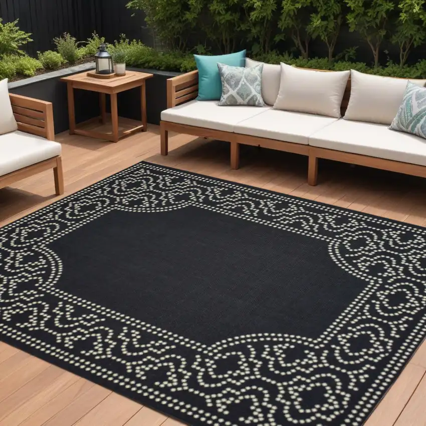 Black and Ivory Stain Resistant Indoor Outdoor Area Rug Photo 1