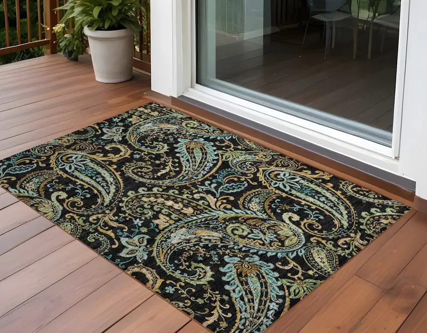 Black and Gold Paisley Washable Indoor Outdoor Area Rug Photo 1