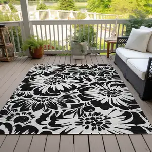 Photo of 3' X 4' Black and Ivory Floral Washable Non Skid Indoor Outdoor Area Rug