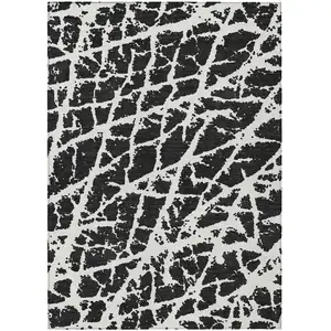 Photo of 3' X 5' Black and White Abstract Washable Non Skid Indoor Outdoor Area Rug