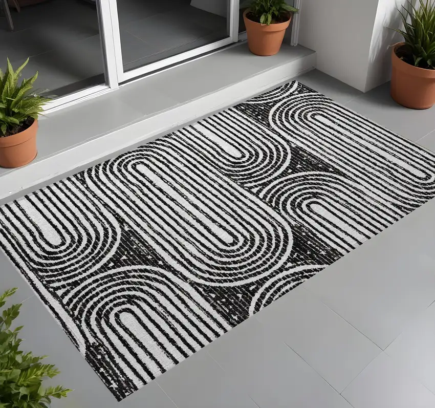 3' X 4' Black and White Abstract Washable Non Skid Indoor Outdoor Area Rug Photo 1