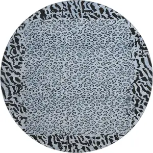 Photo of 8' X 8' Blue And Black Animal Print Washable Round Rug With UV Protection