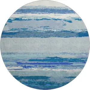Photo of 8' X 8' Blue And Ivory Abstract Washable Round Rug With UV Protection