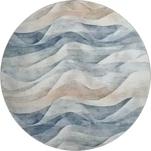Photo of 8' X 8' Blue Beige And Ivory Abstract Washable Round Rug With UV Protection