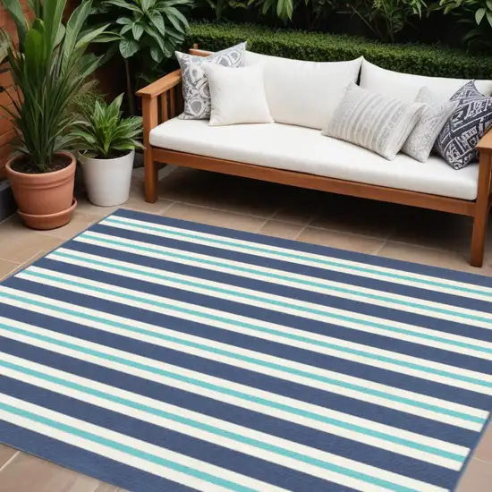 Blue and Ivory Geometric Stain Resistant Indoor Outdoor Area Rug Photo 1