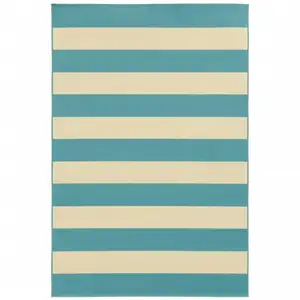 Photo of 9' X 13' Blue Geometric Stain Resistant Indoor Outdoor Area Rug