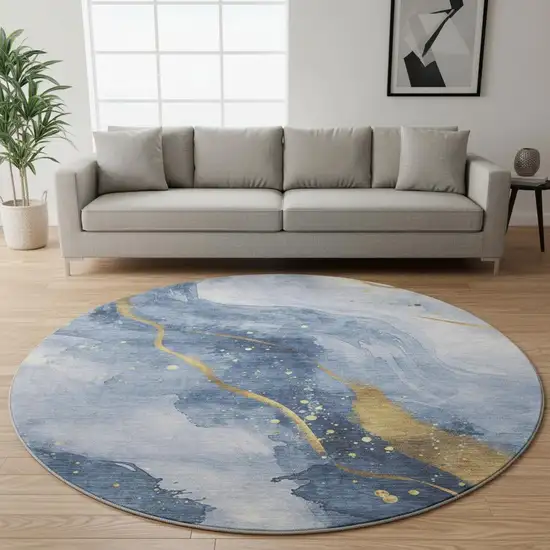 8' X 8' Blue Gold And Ivory Abstract Washable Round Rug With UV Protection Photo 2