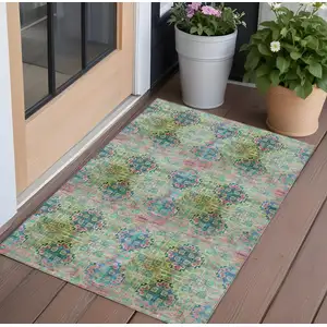 Photo of 3' X 5' Blue and Green Floral Medallion Washable Non Skid Indoor Outdoor Area Rug