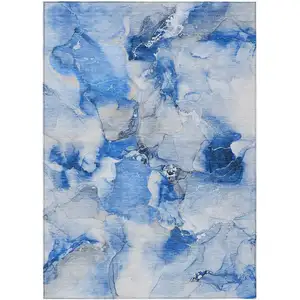 Photo of 3' X 4' Blue and Ivory Abstract Washable Non Skid Indoor Outdoor Area Rug