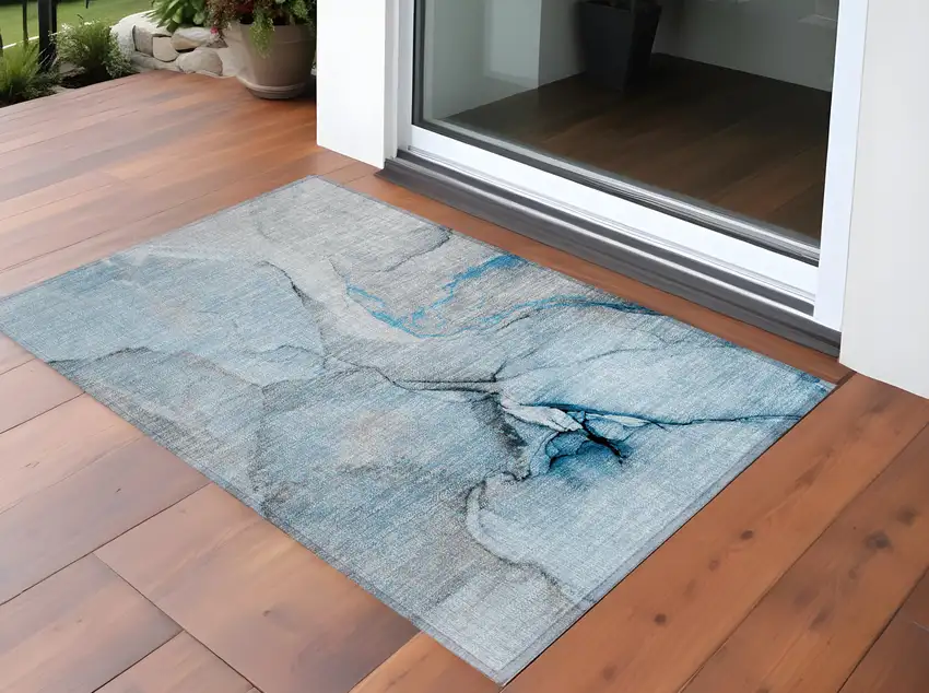 3' X 4' Blue and Ivory Abstract Washable Non Skid Indoor Outdoor Area Rug Photo 1