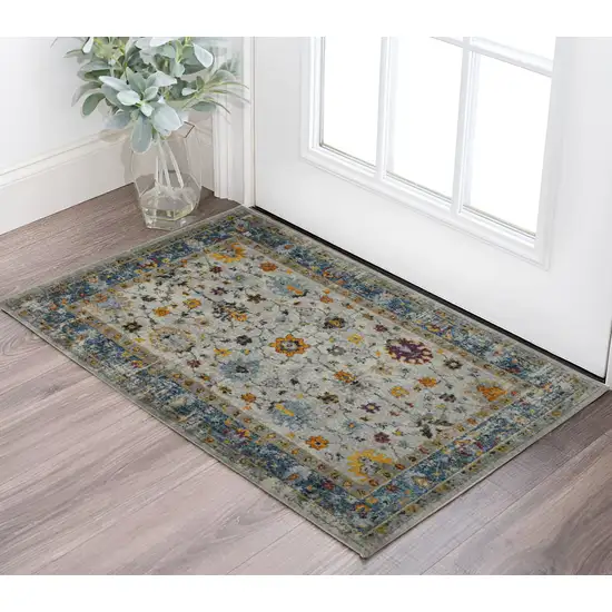 3' X 5' Blue and Orange Floral Power Loom Area Rug Photo 1