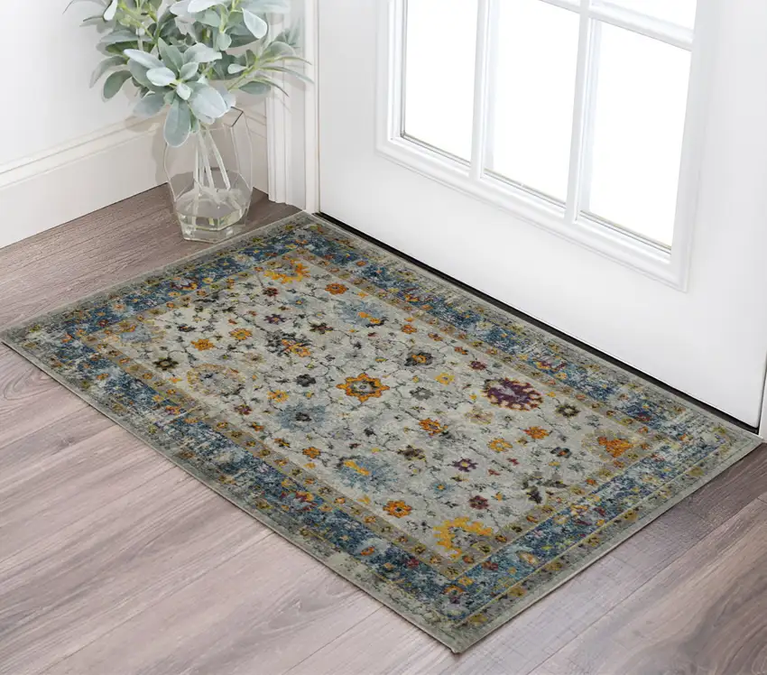 3' X 5' Blue and Orange Floral Power Loom Area Rug Photo 1