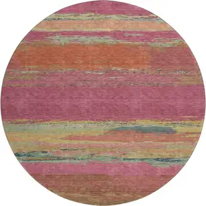 Photo of 8' X 8' Blush Orange And Teal Abstract Washable Round Rug With UV Protection