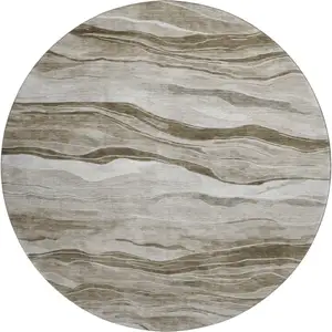 Photo of 8' X 8' Brown And Beige Striped Washable Round Rug With UV Protection