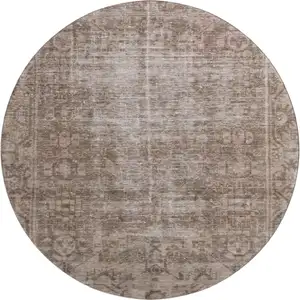 Photo of 8' X 8' Brown Beige And Taupe Oriental Washable Round Rug With UV Protection