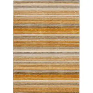 Photo of 3' X 5' Brown and Orange Striped Washable Non Skid Indoor Outdoor Area Rug
