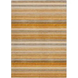 Photo of 3' X 5' Brown and Orange Striped Washable Non Skid Indoor Outdoor Area Rug