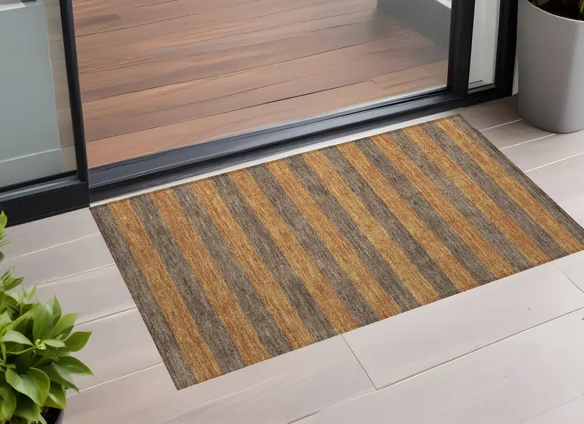 3' X 5' Brown and Tan Striped Washable Non Skid Indoor Outdoor Area Rug Photo 1
