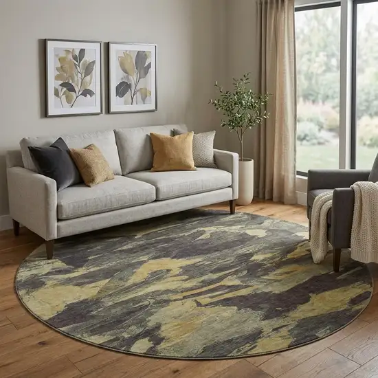 8' X 8' Charcoal And Gold Abstract Washable Round Rug With UV Protection Photo 1