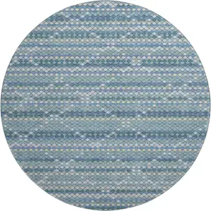 Photo of 8' X 8' Denim Blue Ivory And Teal Geometric Washable Round Rug With UV Protection