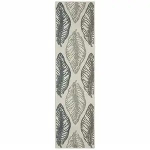 Photo of 2' X 7' Floral Stain Resistant Indoor Outdoor Area Rug