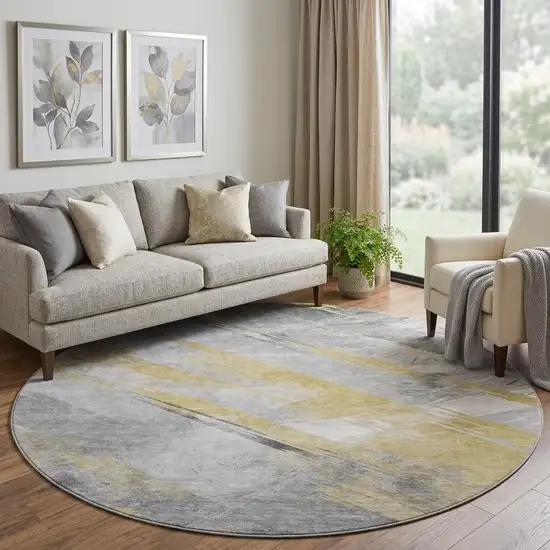 8' X 8' Gold Gray And Ivory Striped Washable Round Rug With UV Protection Photo 1