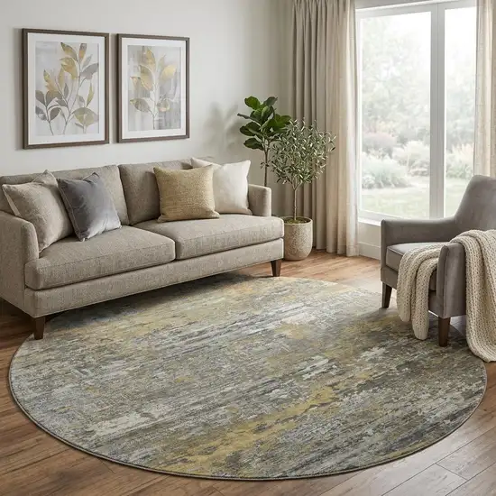 8' X 8' Gold Gray And Silver Abstract Washable Round Rug With UV Protection Photo 1