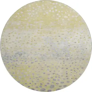 Photo of 8' X 8' Gold Ivory And Gray Polka Dot Washable Round Rug With UV Protection