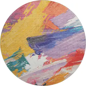 Photo of 8' X 8' Gold Purple Teal And Red Abstract Washable Round Rug With UV Protection