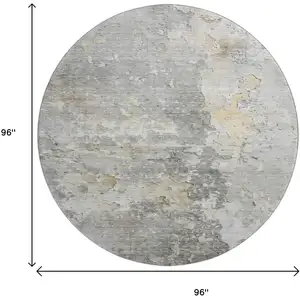 Photo of 8' X 8' Gray Beige And Tan Abstract Washable Round Rug With UV Protection