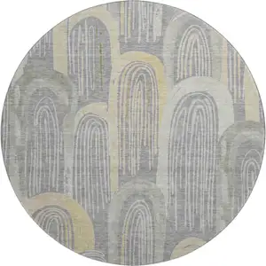 Photo of 8' X 8' Gray Gold And Silver Geometric Washable Round Rug With UV Protection