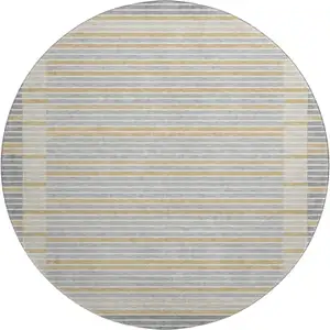Photo of 8' X 8' Gray Gold And Silver Striped Washable Round Rug With UV Protection