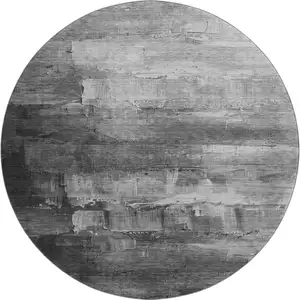 Photo of 8' X 8' Gray Silver And Charcoal Abstract Washable Round Rug With UV Protection