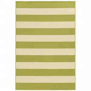 Photo of 9' X 13' Green Geometric Stain Resistant Indoor Outdoor Area Rug
