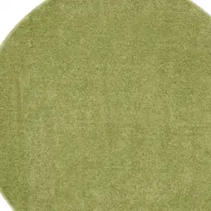 Photo of 4' X 4' Green Round Non Skid Indoor Outdoor Area Rug