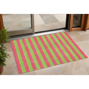 Photo of 3' X 4' Green and Red Striped Washable Non Skid Indoor Outdoor Area Rug