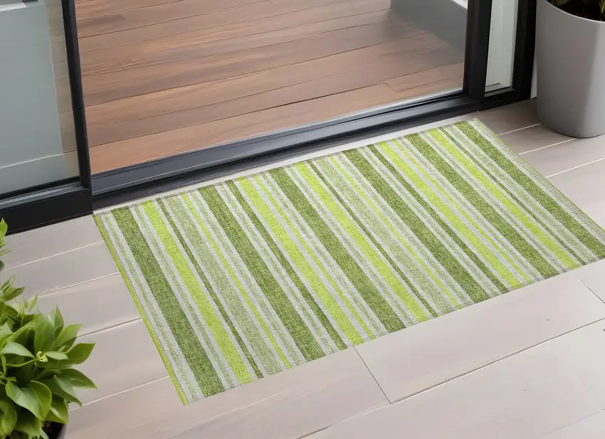 3' X 4' Green and Yellow Striped Washable Non Skid Indoor Outdoor Area Rug Photo 1